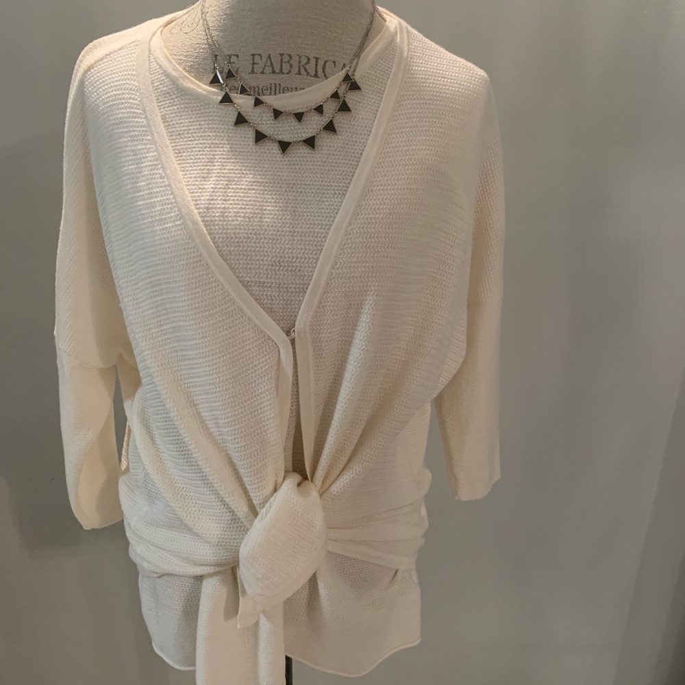 Hemisphere top with a short cardigan over